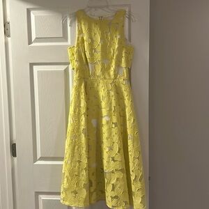 Size small yellow a-line dress excellent condition. Antonio Milani